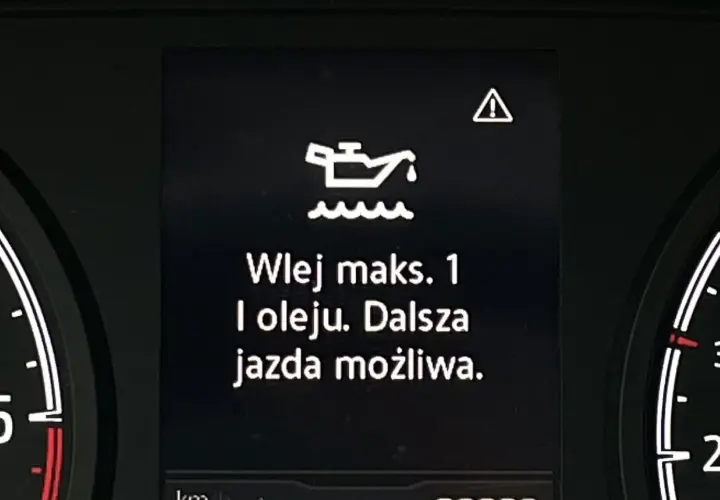 Kontrolka oleju z falą: "Wlej maks. 1 l oleju. Dalsza jazda możliwa." Ostrzeżenie o niskim poziomie oleju.