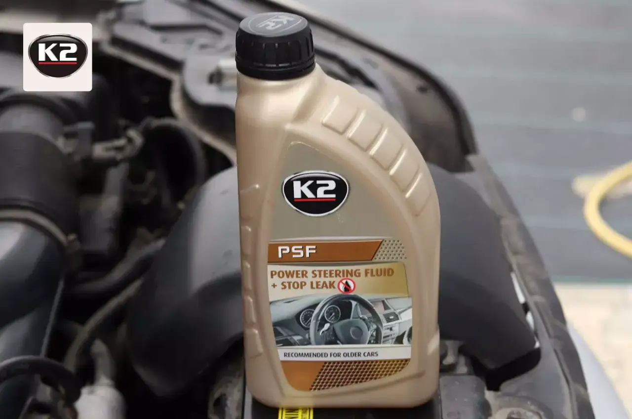 Butelka płynu do wspomagania K2 PSF Power Steering Fluid + Stop Leak, idealna do starszych aut.